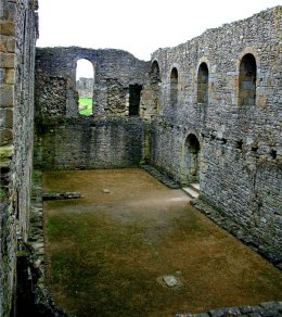 Figure 3. Scolland's Hall - Showing holes for the beams to support the first floor and large arched Norman windows