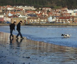 Playing in the sea on Scarborugh South Beach