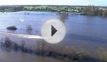 Water-skier deftly navigates flooded village in north England